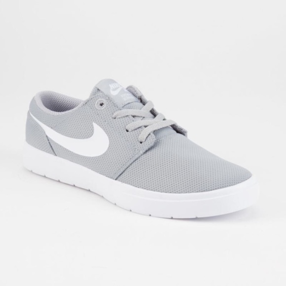 gray nike low tops
